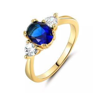 Dainty blue topaz ring